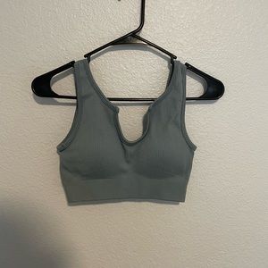 pale/dusty blue-green sports bra